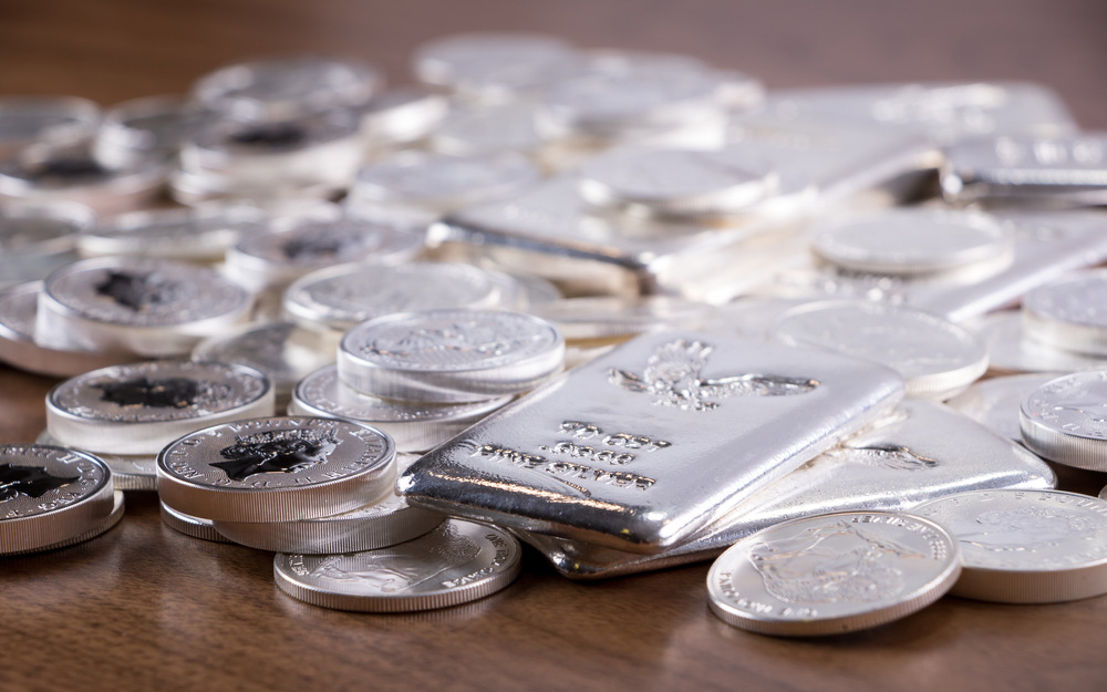 Silver Hits $70 Record; Gold Eases On Strong US Data, Dollar Rally